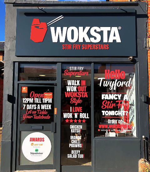 the front of a Woksta takeaway restaurant