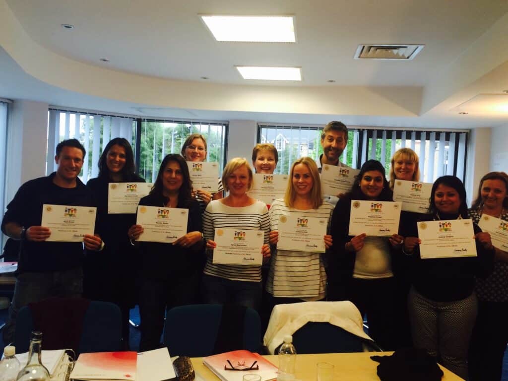 newly qualified franchisees holding their certificates