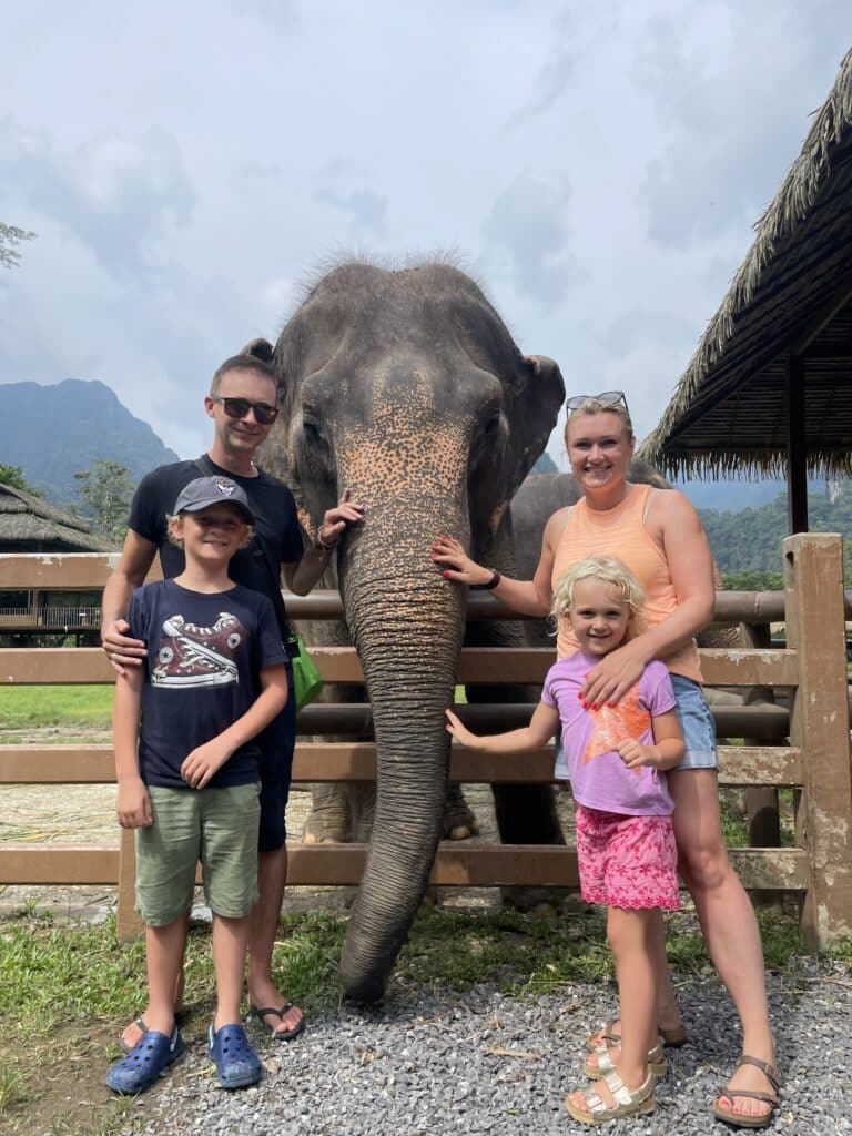 franchisee Becky with her family and an elephant